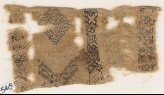 Textile fragment with three parallel bands containing stars and hexagons (EA1984.548)