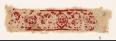 Textile fragment with medallions and ornamental inscription