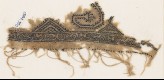 Textile fragment with two half diamond-shapes