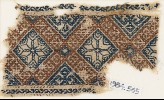 Textile fragment with eight-pointed stars surrounded by crosses