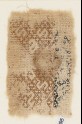Textile fragment with linked diamond-shapes containing S-shapes