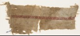 Textile fragment with band of diagonal lines and tendrils