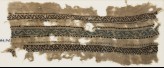 Textile fragment with three parallel bands with an interlacing chain (EA1984.572)