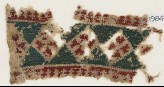 Textile fragment with diamond-shapes containing Maltese crosses (EA1984.576)