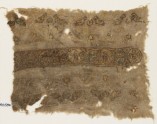 Textile fragment with linked circles and paired birds (EA1984.586)
