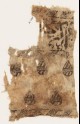 Textile fragment with blazons and remains of naskhi inscription