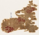 Textile fragment with three circles containing crescents