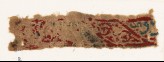 Textile fragment with lozenges, vines, and inscription