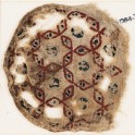 Roundel textile fragment with interlacing hexagons (EA1984.79)