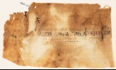 Textile fragment with band of inscription and scrolls (EA1988.62)