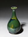 Pear-shaped bottle with a green 'flambé' glaze