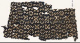 Textile fragment with reversed S-shapes, rosettes, and quatrefoils