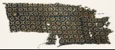 Textile fragment with flowers, dots, and rosettes (EA1990.107)
