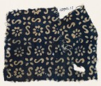Textile fragment with S-shapes, rosettes, and flowers (EA1990.11)