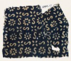 Textile fragment with S-shapes, rosettes, and flowers