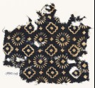 Textile fragment with rosettes, stepped squares, and crosses (EA1990.110)