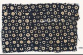 Textile fragment with rings, stars, and dots (EA1990.115)