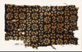 Textile fragment with reversed S-shapes, rosettes, and quatrefoils (EA1990.12)