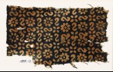 Textile fragment with reversed S-shapes, rosettes, and quatrefoils