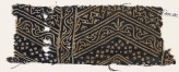 Textile fragment with linked chevrons, vine, and stars (EA1990.132)