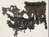 Textile fragment with linked chevrons and flowers, possibly from a garment