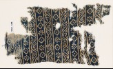 Textile fragment with bands of vines, rosettes, and diamond-shapes (EA1990.138)