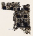 Textile fragment with linked squares, stylized flower-heads, and lines with dots (EA1990.142)
