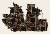 Textile fragment with linked squares, stylised flower-heads, and lines with dots (EA1990.144)