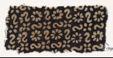 Textile fragment with S-shapes, rosettes, and quatrefoils (EA1990.15)