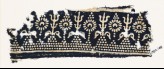 Textile fragment with stylized trees and flowers