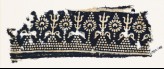 Textile fragment with stylized trees and flowers