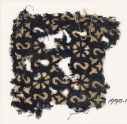 Textile fragment with reversed S-shapes, rosettes, and quatrefoils