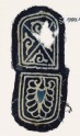 Two tabs, one with a palmette, the other with a cross and leaves (EA1990.186)