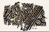 Textile fragment with swirling tendrils, tear-drops, and squares (EA1990.192)