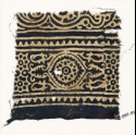 Textile fragment with medallion, and rosettes set into linked stars