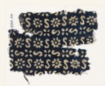 Textile fragment with S-shapes, rosettes, and flowers (EA1990.20)