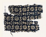 Textile fragment with S-shapes, rosettes, and flowers