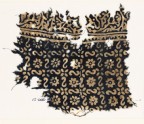 Textile fragment with reversed S-shapes, rosettes, and flowers