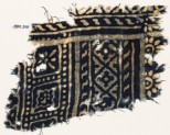 Textile fragment with diamond-shapes, and squares with rosettes (EA1990.210)