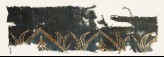 Textile fragment with arches and leaves (EA1990.231)