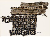 Textile fragment with S-shapes, rosettes, and quatrefoils (EA1990.24)