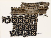 Textile fragment with S-shapes, rosettes, and quatrefoils