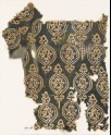 Textile fragment with ovals and stylized floral shapes (EA1990.253)