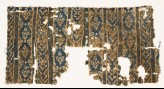 Textile fragment with bands of interlocking chevrons and linked medallions