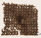 Textile fragment with quatrefoils and circles