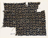 Textile fragment with S-shapes, rosettes, and quatrefoils