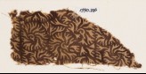 Textile fragment with swirling leaves