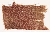 Textile fragment with tendrils, leaves, and dots