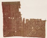 Textile fragment with rosettes set into linked stars (EA1990.331)