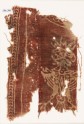 Textile fragment with large stylized form, possibly a double-headed eagle